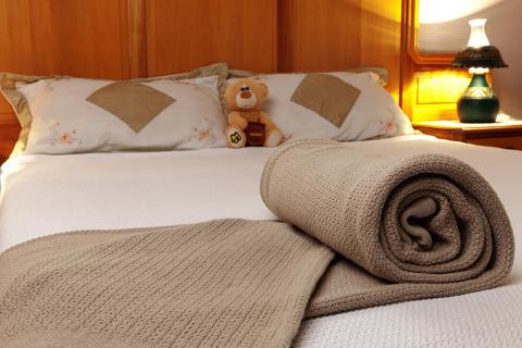 4 Cellular Blanket Stone on bed ed694f5288cad319d1fc9d27458698d6