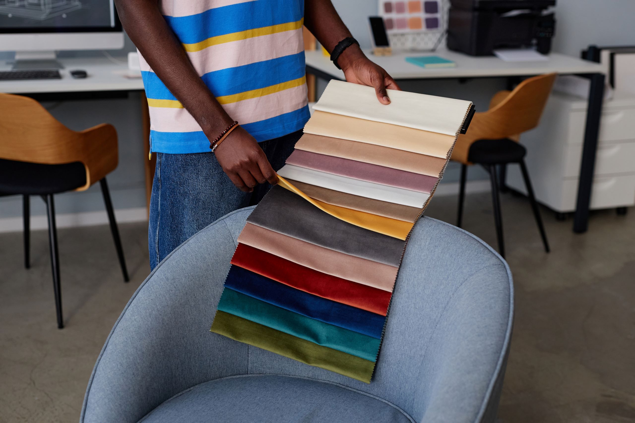 designer examining samples of textile 2025 03 09 23 44 20 utc